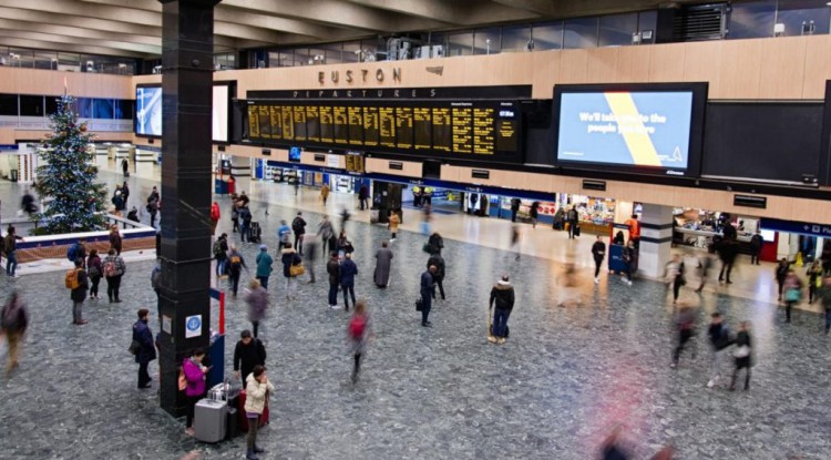 inside of an airport with people