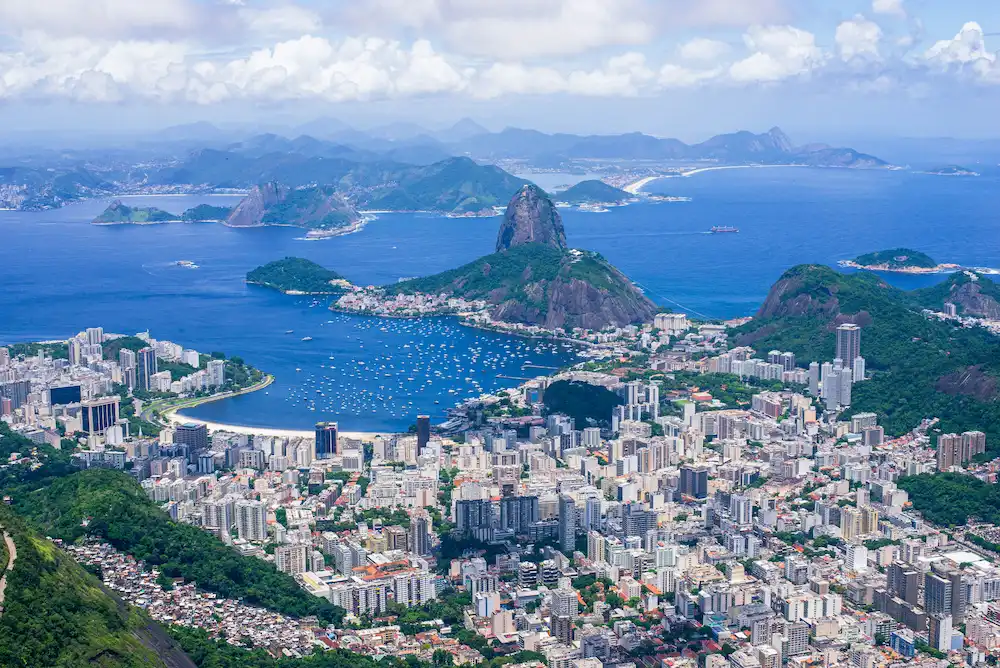 Aerial view of Rio de Janeiro with Sugarloaf Mountain, Guanabara Bay, and the Botafogo neighborhood in the background